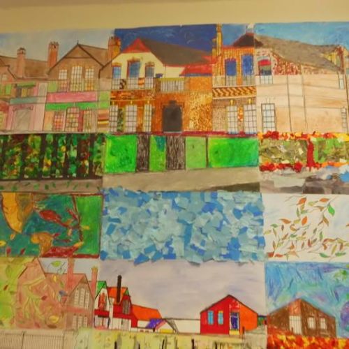 A collaborative picture including a piece of jigsaw collaged from each class