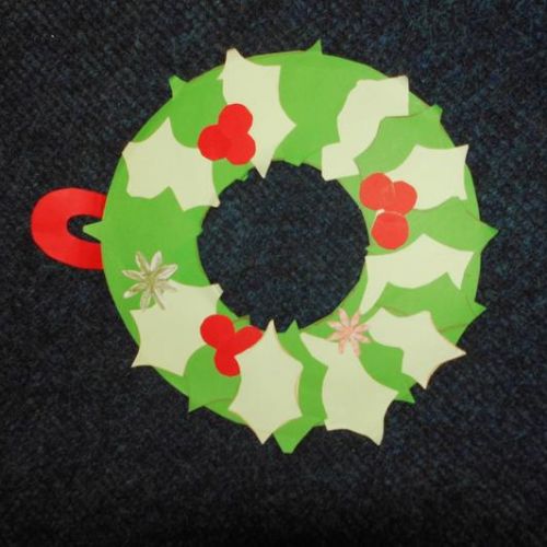 We wish you a Happy Christmas! We made these wreaths in year 4!